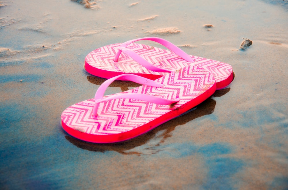 pink and white flip flops
